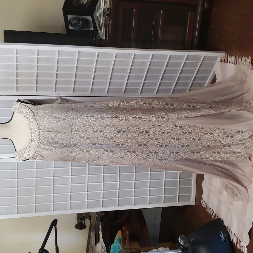 Formal Dress champagne color dress. Sleeveless. Pearl neckline